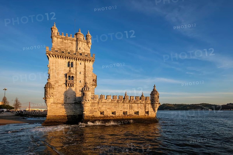 Belem Tower or Tower of St Vincent, famous tourist landmark of Lisboa and tourism attraction, on the bank of the Tagus River Tejo on sunset. Lisbon, Portugal, Europe