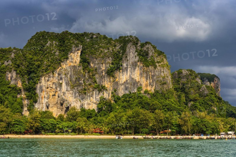 Island landscape near Krabi, stormy sky, thunderstorm, cloudy, weather, sky, storm clouds, nature, force of nature, sea, ocean, island, seascape, travel, tourism, seascape, climate, climate change, horizon, tropical, monsoon, season, season, holiday, chalk cliffs, exotic, bay, bay of the sea, rock, rocky, sandstone cliffs, coast, coastal landscape, landscape, nature, natural landscape, Siam, paradise, holiday paradise, seascape, beach, Railay beach, Phuket, Thailand, Asia