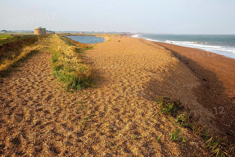 North Sea coastline view of shingle ridge and lagoon on beach bar, Shingle Street, East Lane, Bawdsey, Suffolk, England, UK