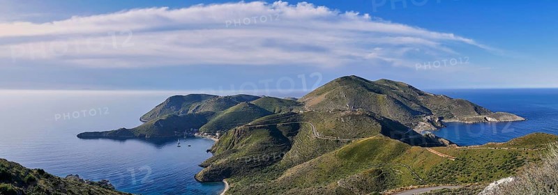 Wide panoramic view of a hilly island chain with clear blue sea, southern tip, Mani peninsula, Peloponnese, Greece, Europe