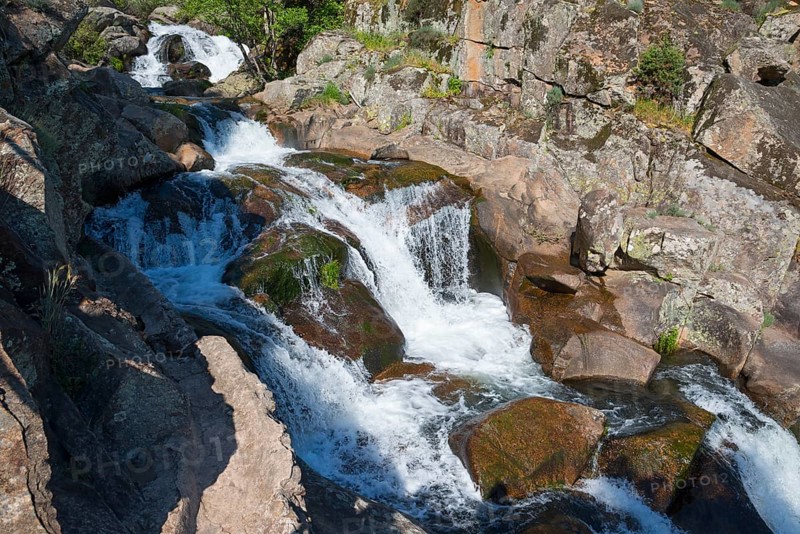 Thundering waterfall over rocks in a quiet forest, clear flowing water, Cascada del Diablo, Devil's Waterfall, Garganta de Gualtaminos, Gualtaminos Gorge, La Vera, Cáceres, Caceres, Extremadura, Spain, Europe