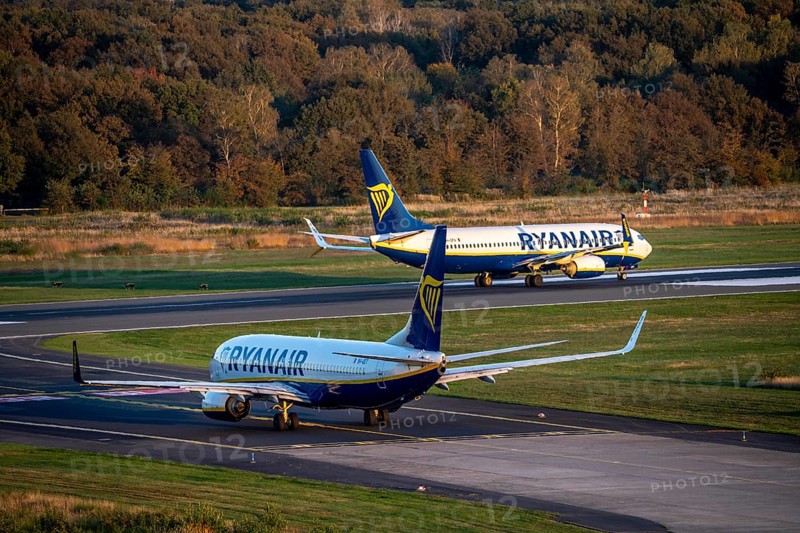 Ryanair Boeing 737 taxis to the runway, another Ryanair aircraft taxis for take-off, Cologne-Bonn Airport, CGN, North Rhine-Westphalia, Germany, Europe