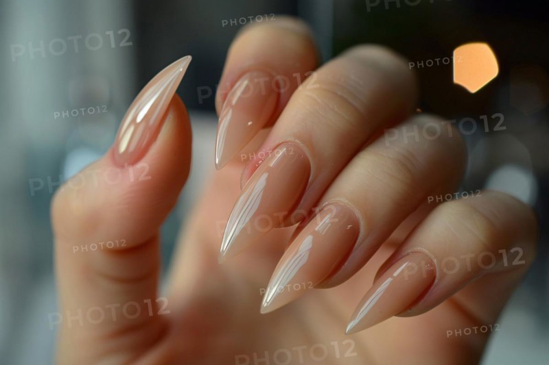 Hand of woman with beautiful long stiletto style nails. KI generiert, generiert, AI generated