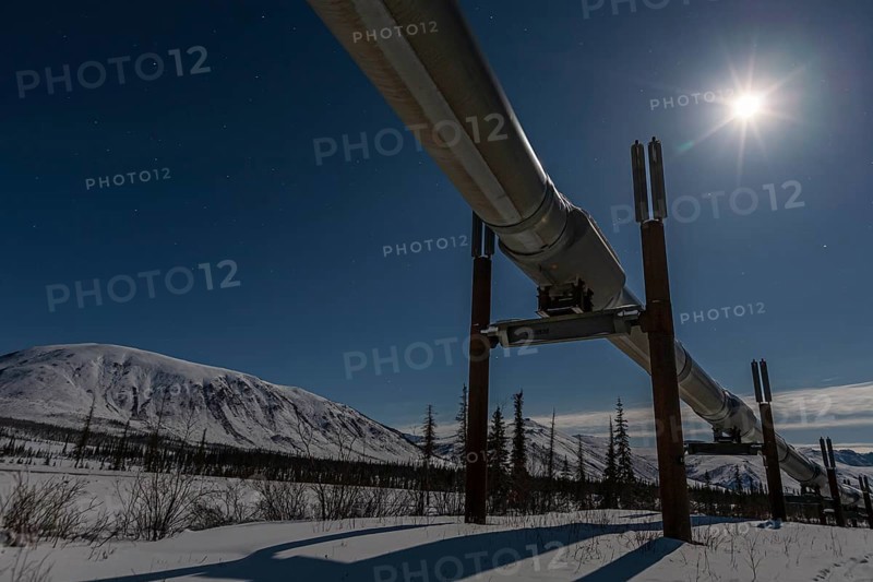Oil production in the Arctic, Trans Alaska Pipeline, full moon, night shot, winter, Dalton Highway, Alaska, USA, North America