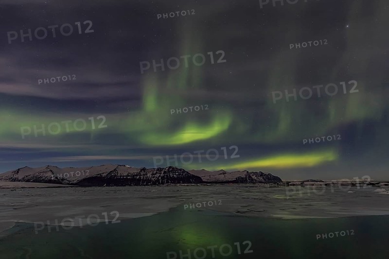 Northern Lights, Aurora borealis over glaciers and Jökulsarlon, Vatnajökull, Iceland, Europe