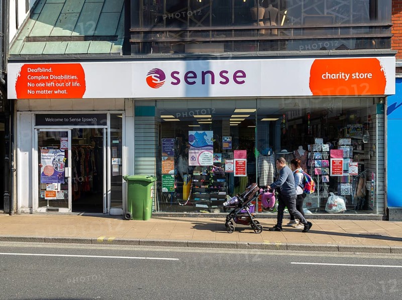 Sense charity shop on street in town centre of Ipswich, Suffolk, England, UK