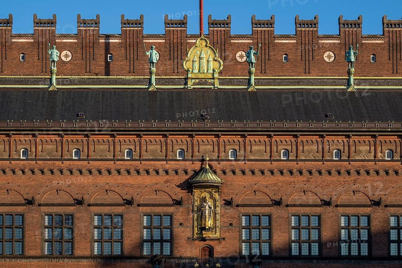 Brick façade with gilded sculpture of Bishop Absalon, Town Hall in the National Romantic style by Martin Nyrop, Town Hall Square, Rathausplatz or Rådhuspladsen, Copenhagen, Denmark, Europe