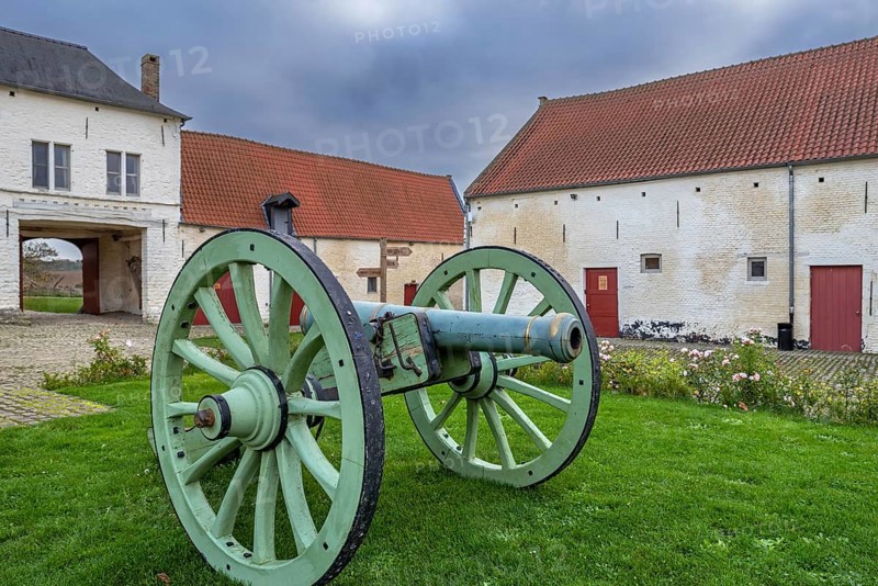 Cannon at Château d'Hougoumont, fortified farm, manor, defended by British troops during the 1815 Battle of Waterloo at Braine-l'Alleud, Belgium, Europe