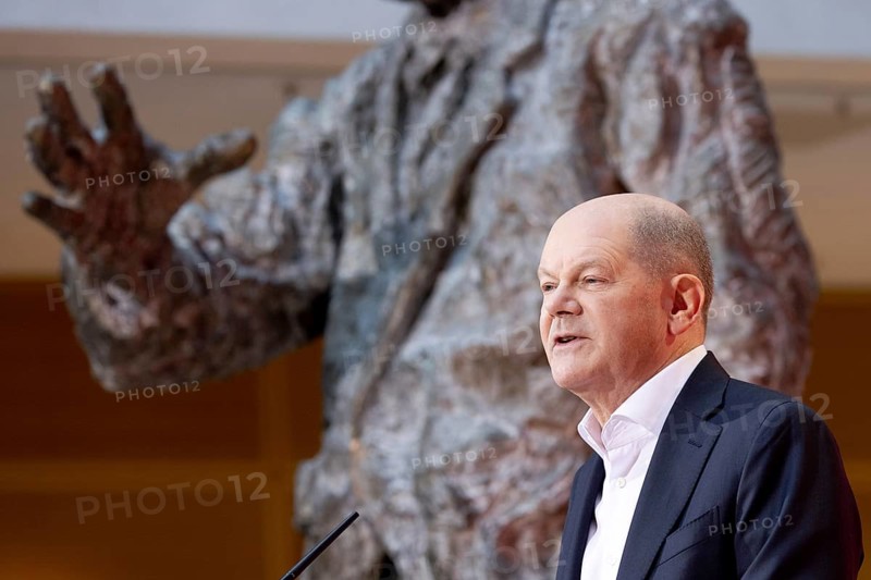 Berlin, Germany - 30 November 2024: Olaf Scholz, Federal Chancellor and lead candidate of the SPD for the 2025 federal elections, speaks in front of the statue of Willy Brandt in the Willy Brandt House during the so-called election victory conference at the start of the federal election campaign