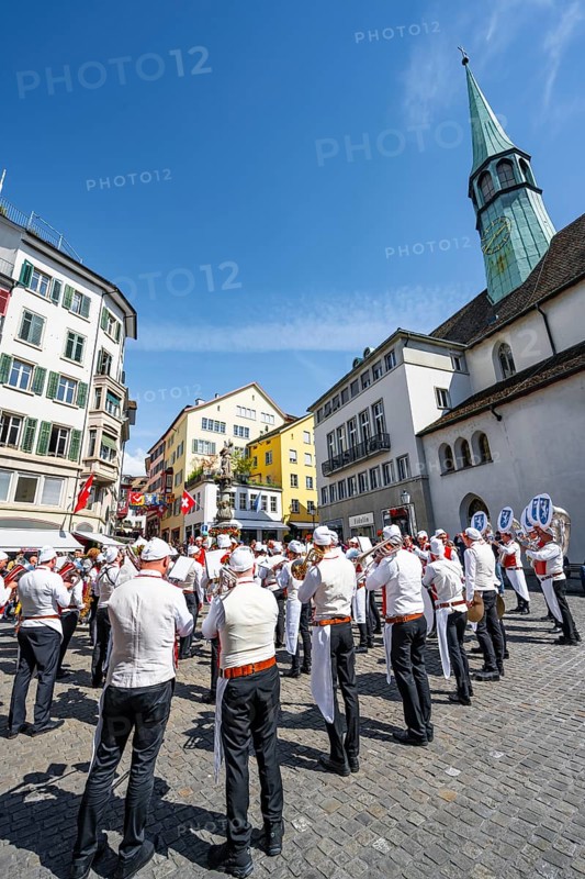 Historically costumed guildsmen in Zurich's Old Town, stand concert at Münzplatz, Zunft zum Weggen, Sechseläuten or Sächsilüüte, Zurich Spring Festival, Zurich, Switzerland, Europe