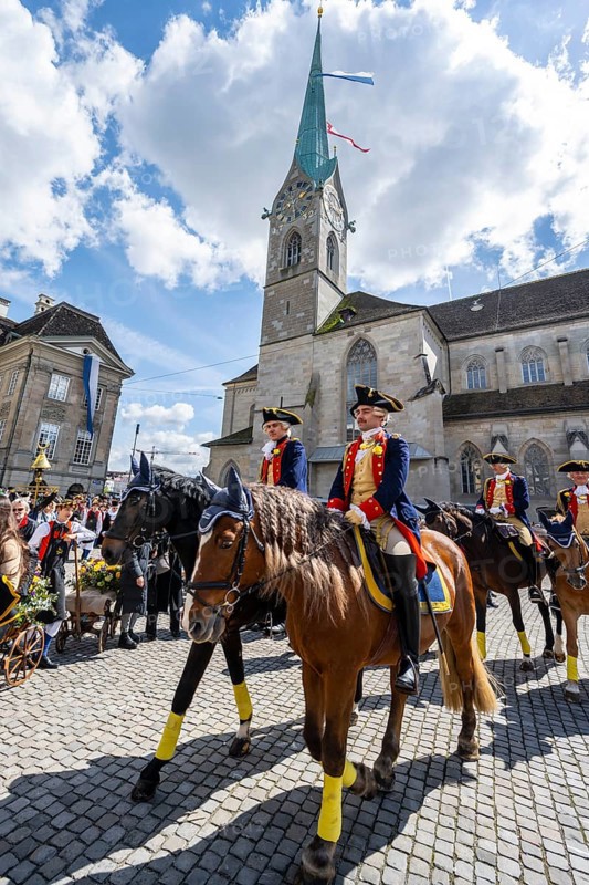Historically costumed guild members in Zurich's old town, riders in front of the Fraumünster church, Zunft zur Meisen, Sechseläuten or Sächsilüüte, Zurich Spring Festival, Zurich, Switzerland, Europe