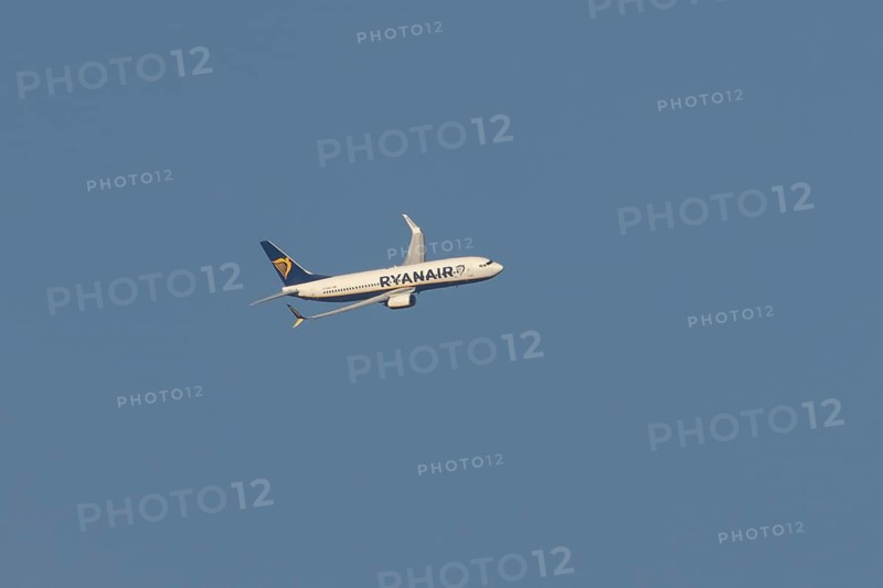 Boeing 737 jet passenger aircraft of Ryanair flying in a blue sky, Rome, Italy, Europe