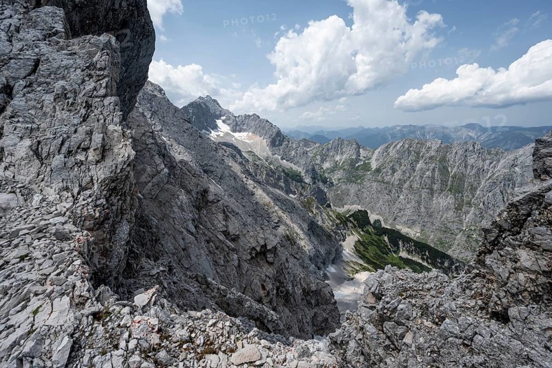 Rocky, steep mountain landscape, view of the Höllental and Zugspitze, crossing of the Jubiläumsgrat, Wetterstein range, Bavaria, Germany, Europe