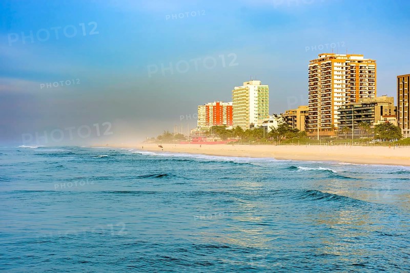 Sunrise on Barra da Tijuca beach seen from the breakwater pier in the city of Rio de Janeiro Rio de Janeiro, RJ, Brazil, South America