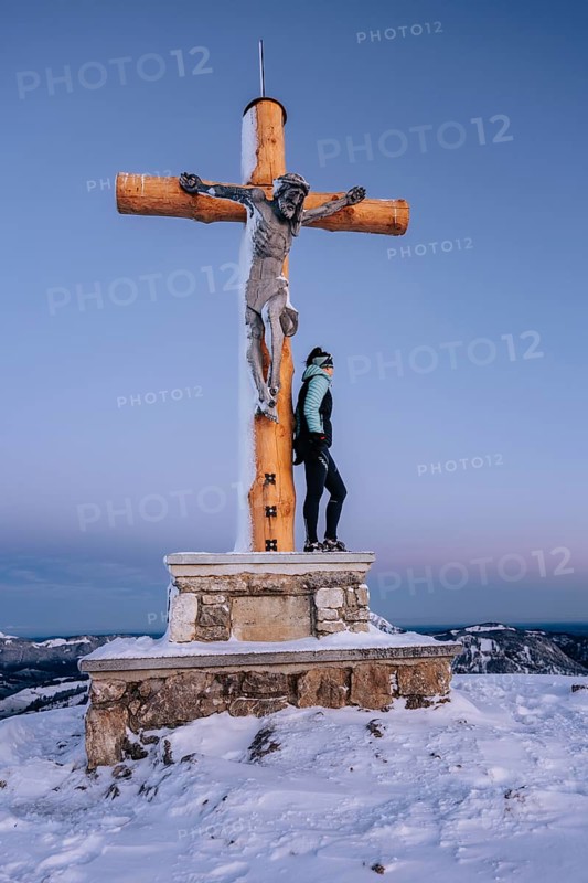 Summit bliss in the snow-covered winter landscape in the Tannheimer Tal in the Alps on the Neunerköpfle, Tyrol, Austria, Europe