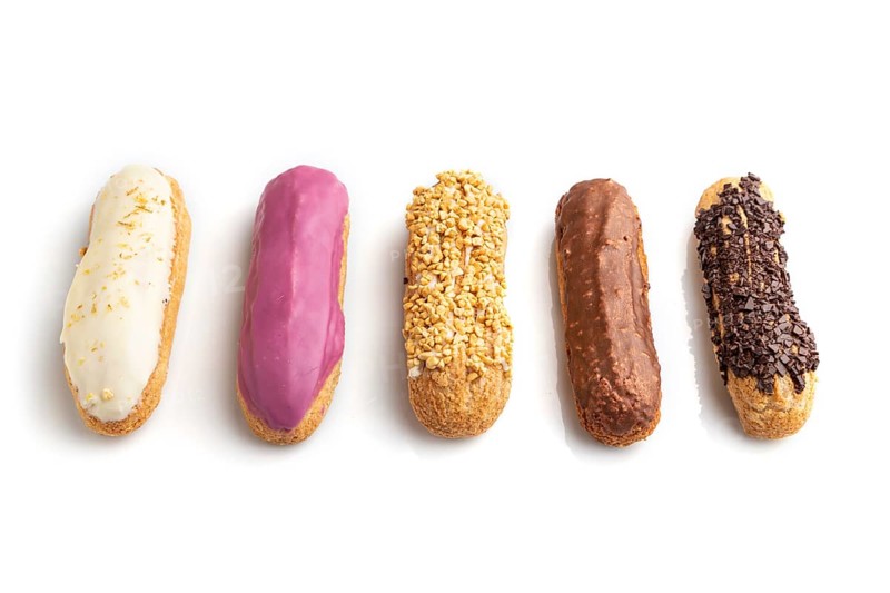 Set of eclair, traditional french dessert isolated on white background. side view, close up, still life