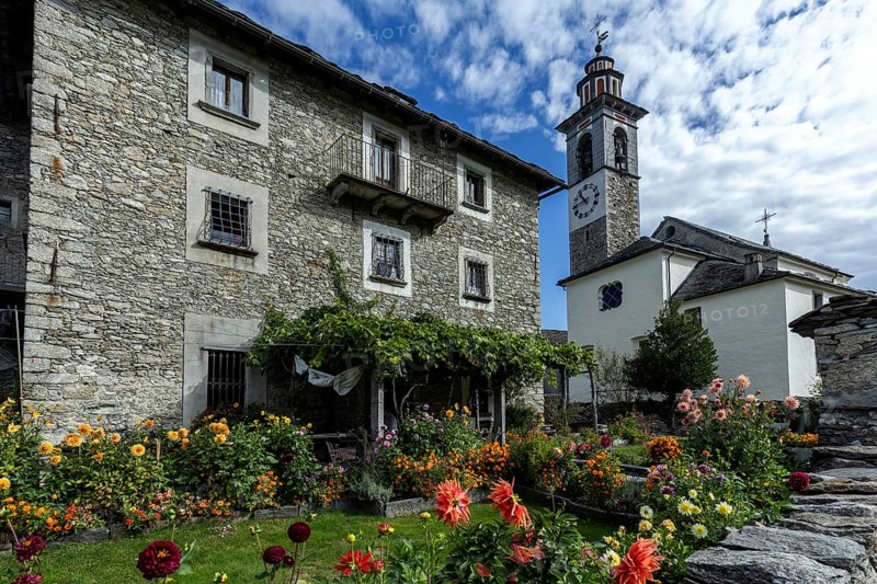 View of the village, typical Ticino stone houses in the mountain village of Rasa, Centovalli, Canton Ticino, Switzerland, Europe