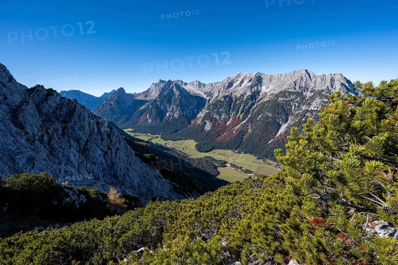 Mountain landscape in autumn, view of the Leutasch valley with mountain peak of the Wetterstein ridge in the Wetterstein mountains, ascent to the Große Arnspitze, near Scharnitz, Bavaria, Germany, Europe