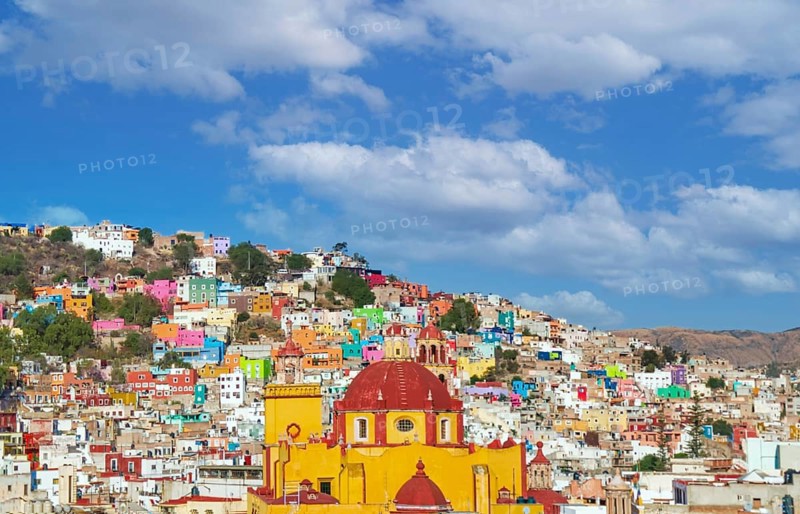 Scenic cobbled streets and traditional colorful colonial architecture in Guanajuato historic city center