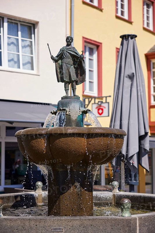 Knjazen Svatopluk I on the Zwentibold fountain with water flowing down in Bad Münstereifel, Eifel, Euskirchen district, North Rhine-Westphalia, Germany, Europe