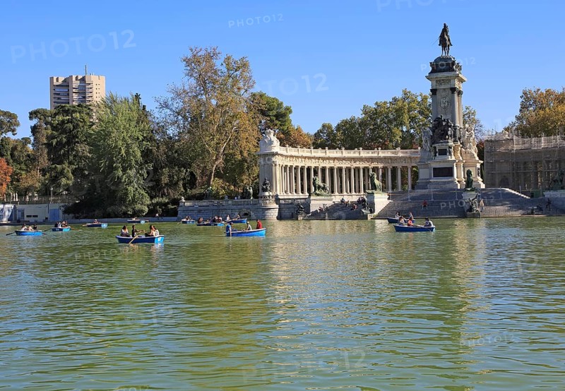 Rowing boats in boating pond of Estanque, El Retiro park, Madrid, Spain, monument to King Alfonso XII, Europe