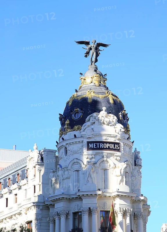 Metropolis building cupola dome with gold and winged angel, Madrid city centre, Spain, architects Jules and Raymond Février 1911, Europe