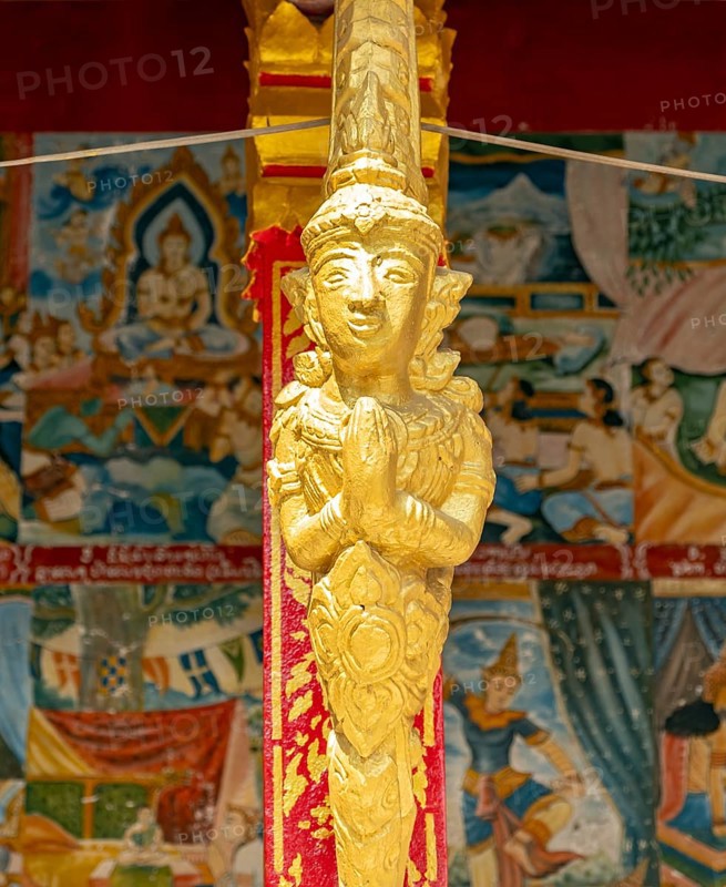 Gilded deity statue, Wat Phonxay, Luang Prabang, Laos, Asia