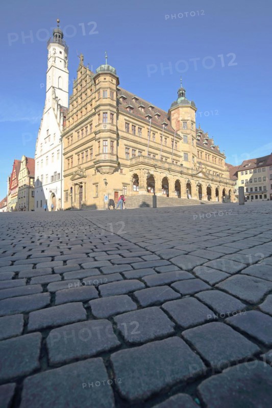 White town hall tower and Renaissance town hall, market square with cobblestones, view from below, perspective, ground, Rothenburg ob der Tauber, Tauberfranken, Franconia, Bavaria, Germany, Europe