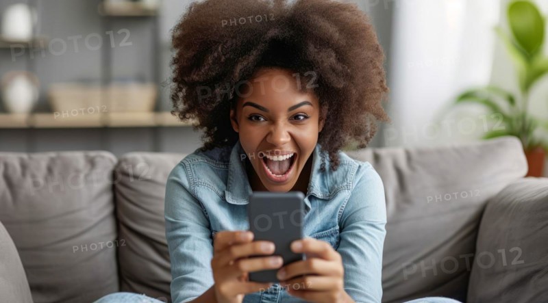 Younge black happy girl playing on smartphone apps, betting money online and shopping online, AI generated
