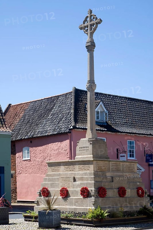 War memorial and historic buildings in the town of Holt, north Norfolk, England, United Kingdom, Europe
