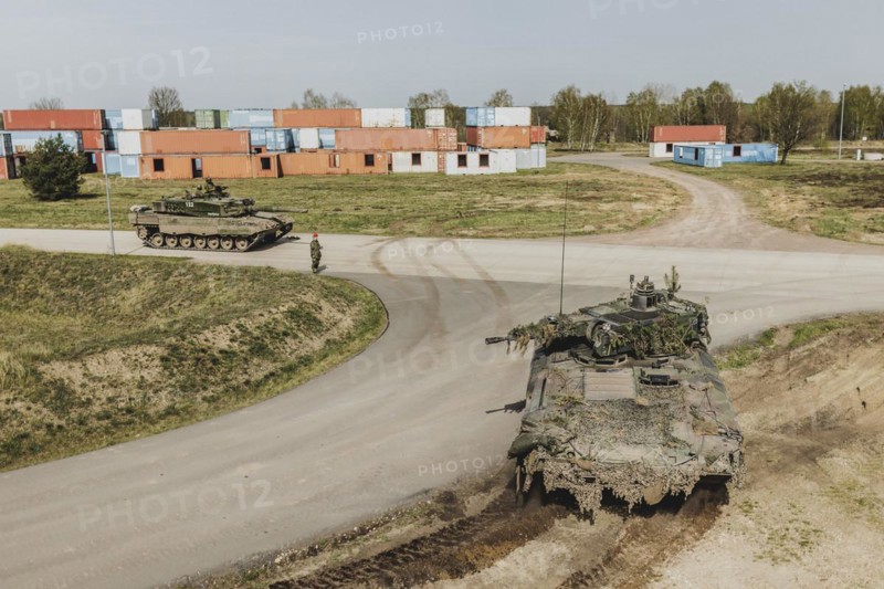 Two tanks, photographed as part of a Bundeswehr exercise with forces from Norway and the Czech Republic during the 'Wettiner Schwert' exercise as part of Quadriga 2024 in the training town of Schnöggersburg, 8 April 2024