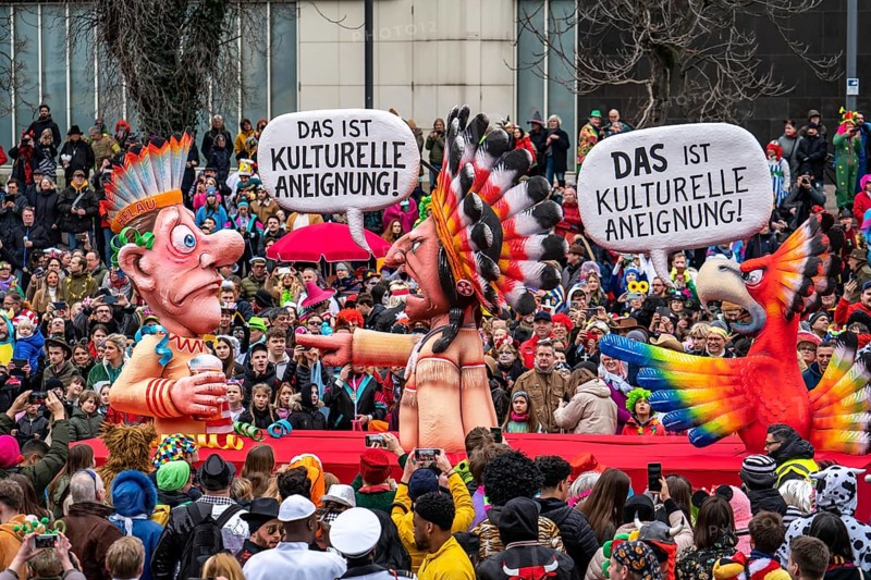 Rose Monday parade in Düsseldorf, street carnival, motif float in carnival, by float builder Jacques Tilly, theme Cultural Appropriations