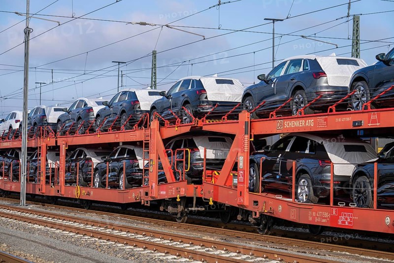 Car train, goods train on its way to the car terminal in Bremerhaven seaport, new German cars for export overseas, Bremerhaven, Bremen, Germany, Europe