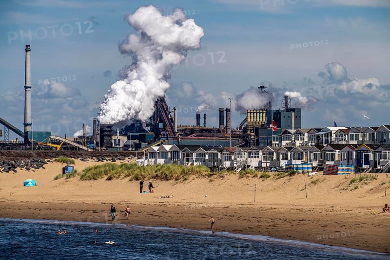 The Tata Steel steel and smelting works in IJmuiden, Velsen, North Holland, Netherlands, largest industrial area in the Netherlands, 2 blast furnaces, 2 coking plants, rolling mills, directly on the North Sea, beach houses near Ijmuiden aan Zee