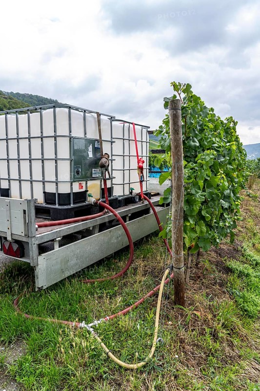 Upper Middle Rhine Valley, water tank for irrigating grapevine plants, in the Kapellenberg vineyard near Lorch, Hesse, Germany, Europe
