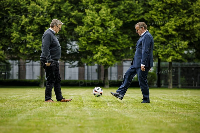 Boris Pistorius (SPD), Federal Minister of Defence, with his brother Harald Pistorius with a football. Recorded during an interview Berlin, 04.06.2024
