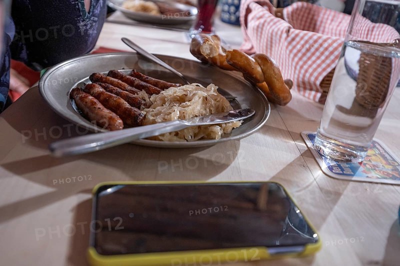 Nuremberg sausages with sauerkraut served on a pewter plate, Nuremberg, Middle Franconia, Bavaria, Germany, Europe