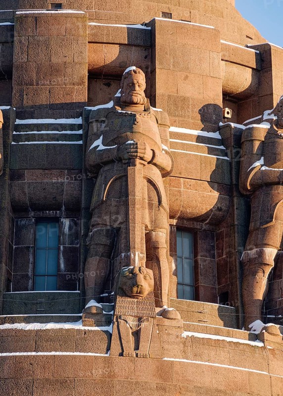 Guardian figures, Völkerschlachtdenkmal on a winter's day with snow, Leipzig, Saxony, Germany, Europe
