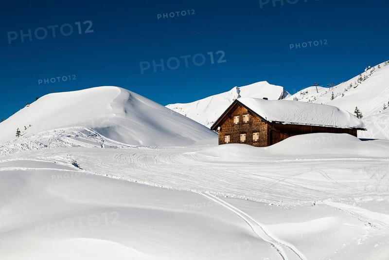 Snow-covered mountains and mountain hut with ski slope, Damüls, Bregenzerwald, Vorarlberg, Austria, Europe