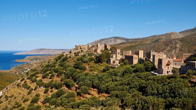 Historic village on a mountain near the coast with clear skies, Vathia, residential tower village, Mani Peninsula, Peloponnese, Greece, Europe