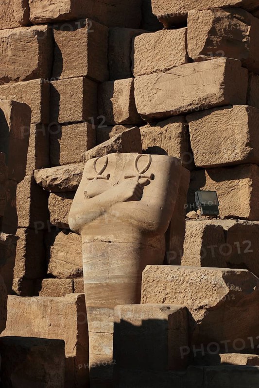 Luxor, Karnak Temple, headless statue with the symbol of the key to life, the Ankh, in the temple complex in Karnak, Africa, Upper Egypt, UNESCO World Heritage Site