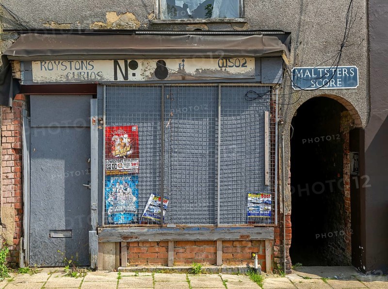Derelict shop Rosystones Curios, Maltsters Score, High Street, Lowestoft, Suffolk, England, UK