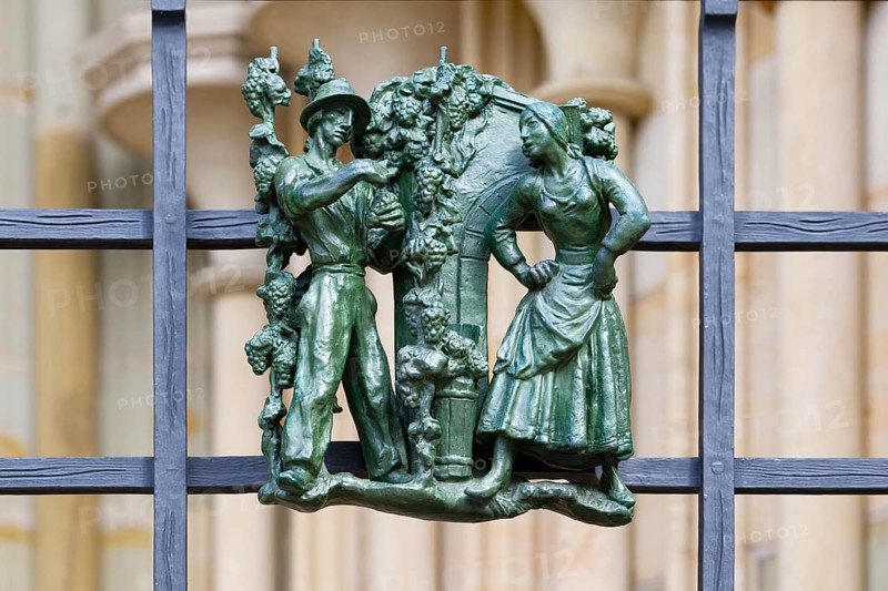 Prague castle, Gothic Metropolitan Cathedral of Saints Vitus, Wenceslas and Adalbert, Decorative figure of daily life scene on a fence, Prague, Czech Republic, Europe