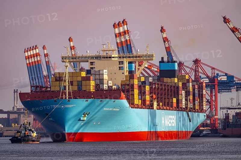 Magleby Maersk container freighter leaves Waltershof harbour after several days at EUROGATE Container Terminal, Hamburg, Germany, Europe