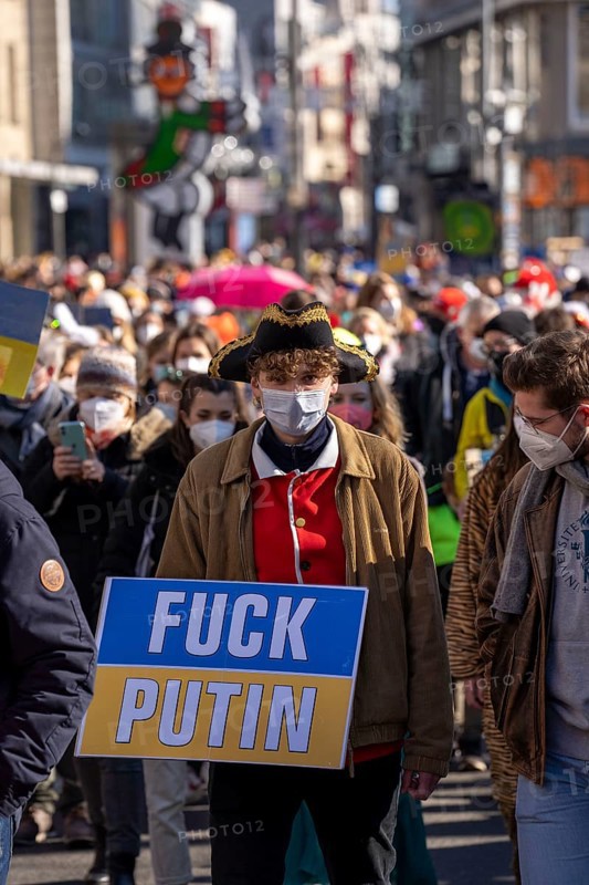 Peace demonstration against the war in Ukraine, instead of the Rose Monday parade in Cologne, with over 250, 000 participants, in the city centre, with many carnivalists, North Rhine-Westphalia, Germany, Europe