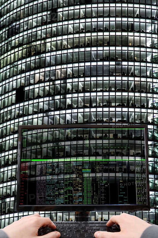 Symbolic image hacker, cyber attack on public buildings, administrations, institutions, town hall, authorities, digital blackmail, data theft, online criminal offences, cyber extortion, ransomware