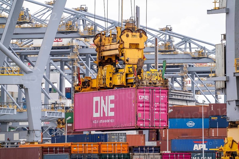 RWG Container Terminal, containers being loaded by crane, seaport of Rotterdam, Maasvlakte 2 deep-sea harbour, on an artificial land area, Netherlands