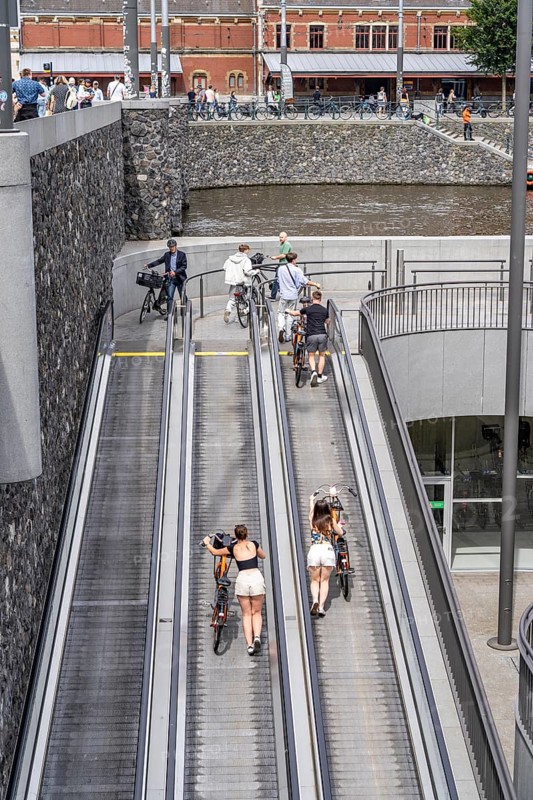 New bicycle car park at Amsterdam Central Station, Stationsplein, space for around 7000 bicycles, largest in Amsterdam, digitally monitored, underground, direct connection to the station and metro, Netherlands, escalators lead to the bicycle garage, Netherlands