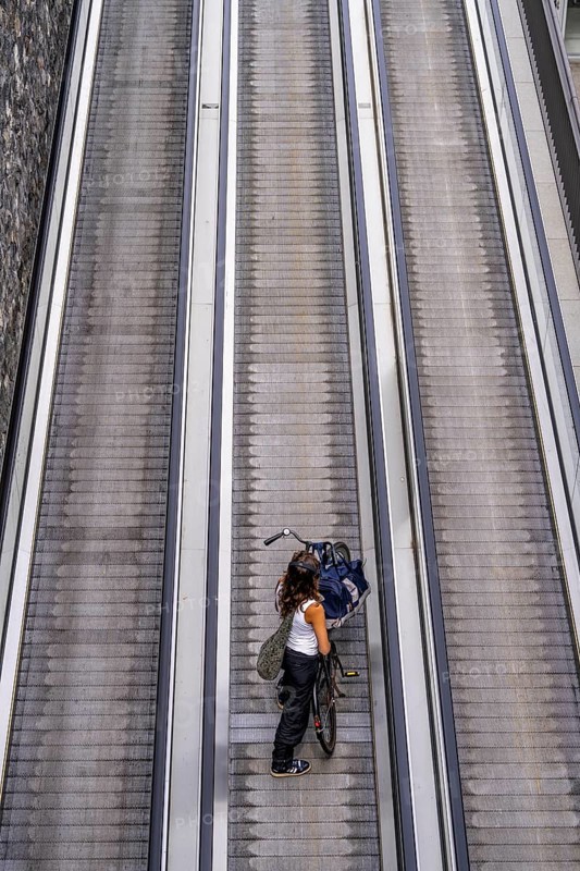 New bicycle car park at Amsterdam Central Station, Stationsplein, space for around 7000 bicycles, largest in Amsterdam, digitally monitored, underground, direct connection to the station and metro, Netherlands, escalators lead to the bicycle garage, Netherlands