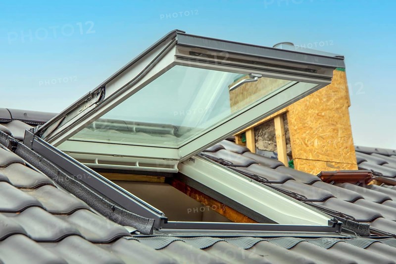 New skylight on a newly tiled roof